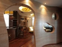 Арка в коридорі (61 фото): як оформити арку з гіпсокартону між передпокоєм і кухнею? Дизайнерські ідеї та особливості обробки