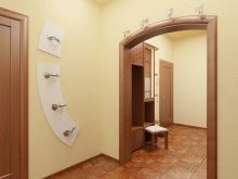 Арка в коридорі (61 фото): як оформити арку з гіпсокартону між передпокоєм і кухнею? Дизайнерські ідеї та особливості обробки