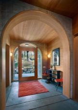 Арка в коридорі (61 фото): як оформити арку з гіпсокартону між передпокоєм і кухнею? Дизайнерські ідеї та особливості обробки