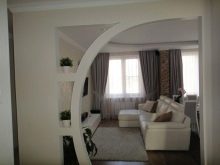 Арка в коридорі (61 фото): як оформити арку з гіпсокартону між передпокоєм і кухнею? Дизайнерські ідеї та особливості обробки