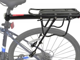 Багажник для велосипеда: опис велобагажников для гірських велосипедів, особливості задніх велосипедних багажників для велосипедів з колесами 26 і 29 дюймів, огляд консольних і універсальних моделей