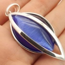 Камінь котяче око (42 фото): як виглядає натуральний мінерал? Значення і магічні властивості, опис рожевих і зелених, блакитних і білих каменів