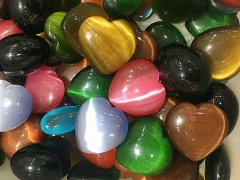 Камінь котяче око (42 фото): як виглядає натуральний мінерал? Значення і магічні властивості, опис рожевих і зелених, блакитних і білих каменів