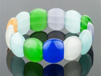 Камінь котяче око (42 фото): як виглядає натуральний мінерал? Значення і магічні властивості, опис рожевих і зелених, блакитних і білих каменів