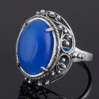 Камінь котяче око (42 фото): як виглядає натуральний мінерал? Значення і магічні властивості, опис рожевих і зелених, блакитних і білих каменів