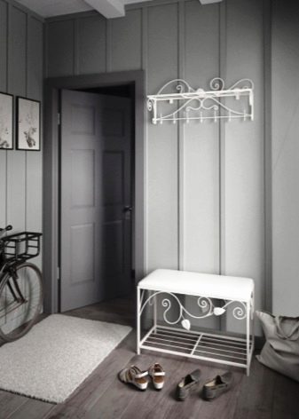 Ковані вішалки в передпокій (42 фото): вибираємо настінні і підлогові ковані вішалки, приклади в інтер’єрі