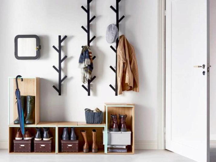 Ковані вішалки в передпокій (42 фото): вибираємо настінні і підлогові ковані вішалки, приклади в інтер’єрі