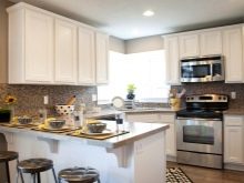 Кухня з мийкою в кутку (43 фото): кухонний гарнітур з кутовою раковиною, варіанти дизайну інтер’єру