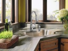 Кухня з мийкою в кутку (43 фото): кухонний гарнітур з кутовою раковиною, варіанти дизайну інтер’єру