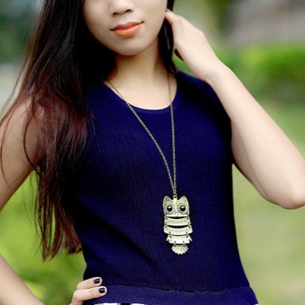 Кулон сова (33 фото): срібло і біле золото, що символізує срібний кулон у вигляді сови, його значення