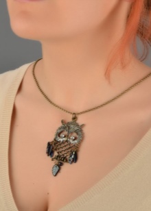 Кулон сова (33 фото): срібло і біле золото, що символізує срібний кулон у вигляді сови, його значення