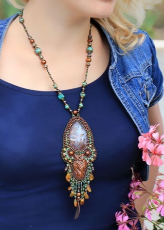 Кулон сова (33 фото): срібло і біле золото, що символізує срібний кулон у вигляді сови, його значення