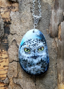 Кулон сова (33 фото): срібло і біле золото, що символізує срібний кулон у вигляді сови, його значення