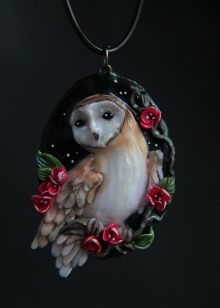 Кулон сова (33 фото): срібло і біле золото, що символізує срібний кулон у вигляді сови, його значення