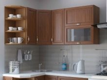 Кутові шафи на кухню (56 фото): огляд підлогових кухонних шафок, варіанти гарнітурів з нижніми шафами зі скошеним кутом