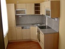 Кутові шафи на кухню (56 фото): огляд підлогових кухонних шафок, варіанти гарнітурів з нижніми шафами зі скошеним кутом