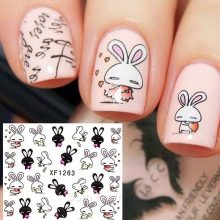 Манікюр з зайчиком (34 фото): дизайн нігтів з малюнком зайця на одному пальці