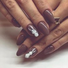 Манікюр з зайчиком (34 фото): дизайн нігтів з малюнком зайця на одному пальці