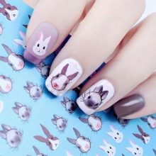 Манікюр з зайчиком (34 фото): дизайн нігтів з малюнком зайця на одному пальці