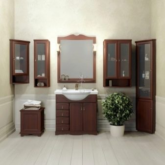 Навісні кутові шафи у ванну кімнату: особливості підвісних шафок, правила розміщення настінного меблів
