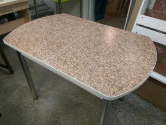 Овальний розсувний стіл на кухню (53 фото): розкладні кухонні обідні столи з масиву дерева, білі складні столи-книжки та інші моделі