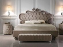 Пуфик в спальню (45 фото): як вибрати приліжкові пуфи і банкетки зі спинкою і ящиком? Красиві м’які пуфи з екошкіри