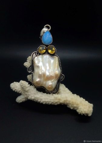 Річкові перли (17 фото): що це таке? Відмінності прісноводних перлів від морського, властивості і видобуток в Росії. Як відрізнити камінь від підробки?