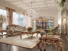 Різьблені столи (42 фото): різьба на ніжках моделей з дерева, дерев’яні журнальні столики і письмові столи з різьбленням на стільниці, інші
