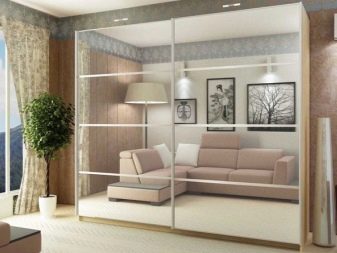 Шафи у вітальню (69 фото): шафа для одягу на всю стіну в зал і орні вбудовані шафи, радіусний сучасний шафа та інші моделі