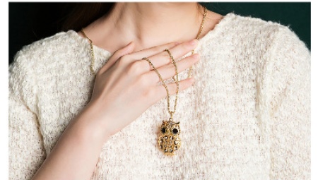 Кулон сова (33 фото): срібло і біле золото, що символізує срібний кулон у вигляді сови, його значення